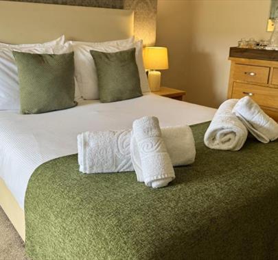 Double bedroom at The Manor Inn in St Bees, Cumbria at night