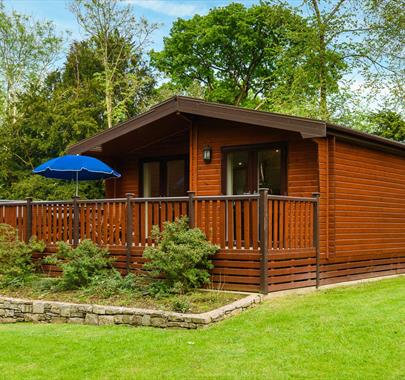 Exterior and Balcony at Woodlands Pine Lodges in Meathop, Lake District