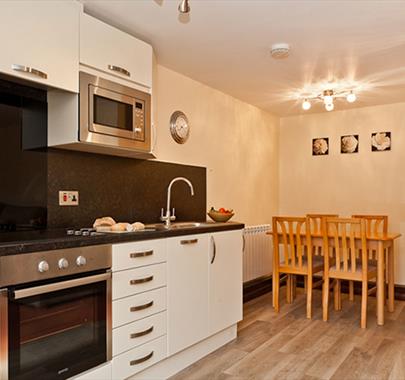 Kitchen and Dining Area in a Self Catered Unit at Burnside Park in Bowness-on-Windermere, Lake District