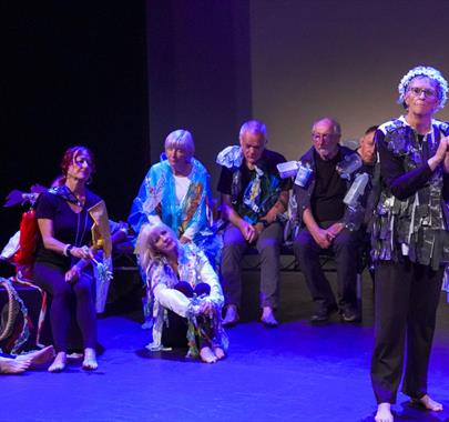 A group of ladies performing on stage