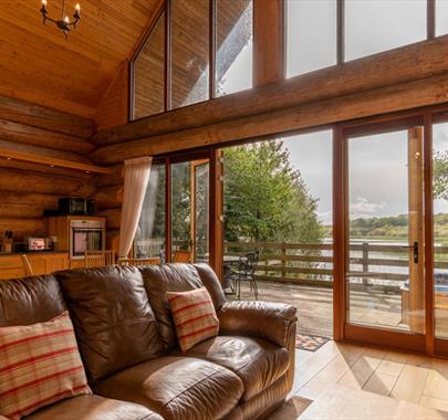 Lounge in Alder Lodge at The Tranquil Otter in Thurstonfield, Cumbria