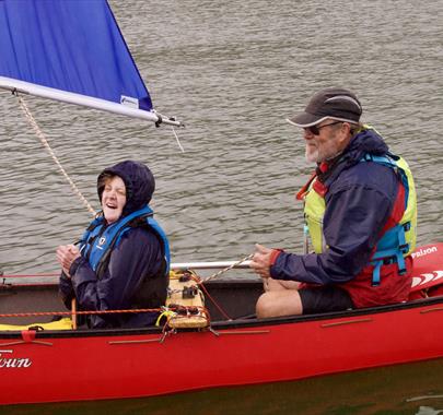 Visitors Canoe Sailing with Anyone Can in the Lake District, Cumbria