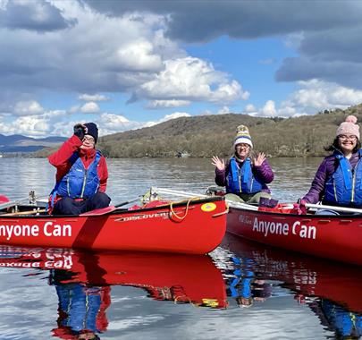 Visitors Canoeing with Anyone Can in the Lake District, Cumbria