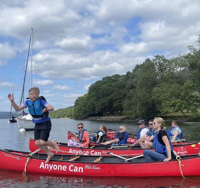 Visitors Canoeing with Anyone Can in the Lake District, Cumbria