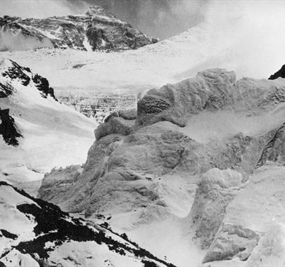 Black and white photo of snowy mountain peaks