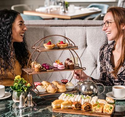 Guests Enjoying Afternoon Tea at The Borrowdale Hotel in Borrowdale, Lake District