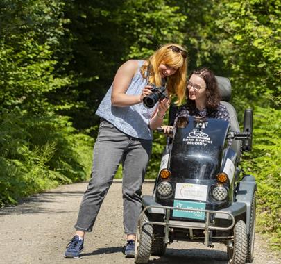 Visitors on a trail at Grizedale Forest in the Lake District, Cumbria
