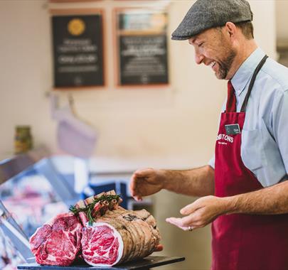 Butcher working at Cranstons in Cumbria