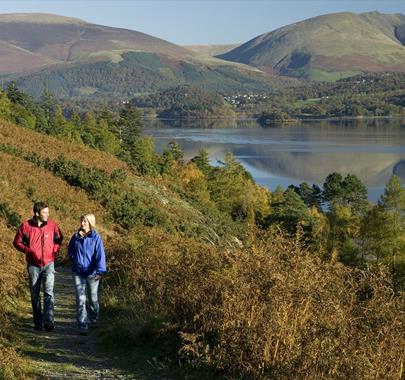 Walkers Enjoying a Lakeside Walk on a Walking Holiday from The Carter Company in the Lake District, Cumbria