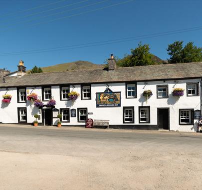 Exterior and Flowers in Bloom at The Horse and Farrier Inn in Threlkeld, Lake District