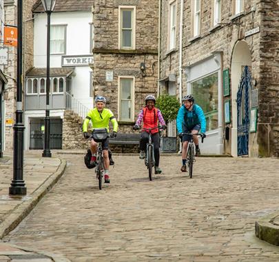 Visitors Cycling in Kendal with E-Bike Safaris Ltd in the Lake District, Cumbria