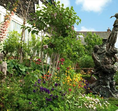 Search for Peter Rabbit in the gardens at The World of Beatrix Potter in Bowness-on-Windermere, Lake District
