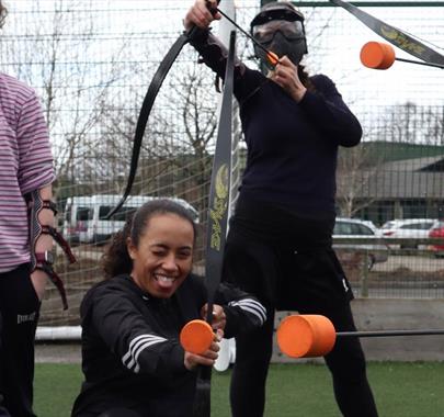 Visitors Playing Archery Tag with Genuine Adventures in the Lake District, Cumbria