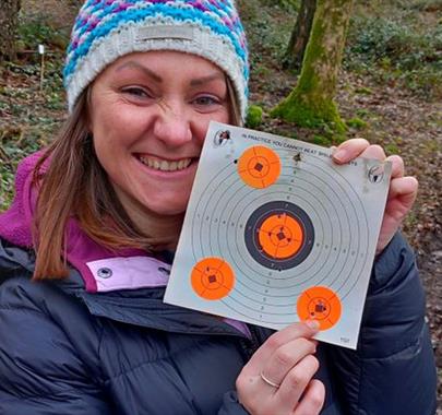 Visitor with Shooting Target with Green Man Survival in Newby Bridge, Lake District