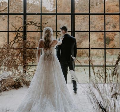 Couple getting married at Hidden River Barn near Longtown, Cumbria