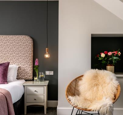 Double bedroom and decor in Hoglet Cottage at Dandelion & Hoglet Cottages, near Dalston, Cumbria