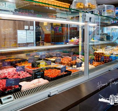 Interior and Display Case at Home Farm Butchers Shop in Aspatria, Cumbria