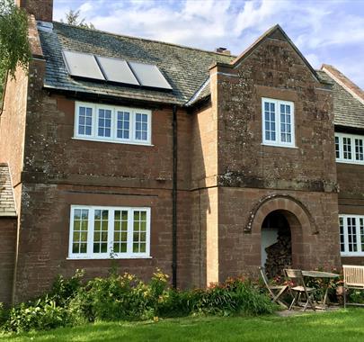 Exterior and Outdoor Seating at Keepers Cottage in Ivegill, Cumbria