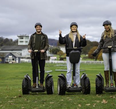 Visitors enjoying an experience with Lakeland Segway in Cartmel, Lake District