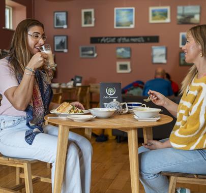 Visitors enjoy food and drink at Lanercost Tea Room & Gift Shop near Brampton, Cumbria