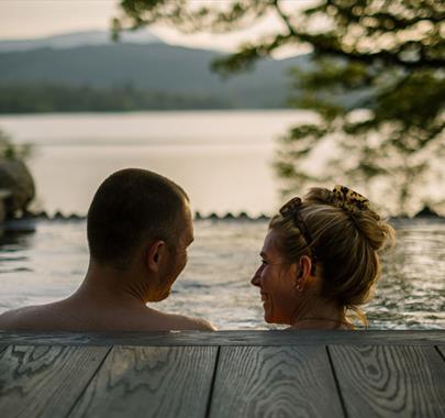 Couple in Infinity Pool at The Spa at Low Wood Bay Resort in Windermere, Lake District