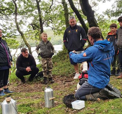 Visitors on a Canoe and Bushcraft Experience with Path to Adventure in the Lake District, Cumbria