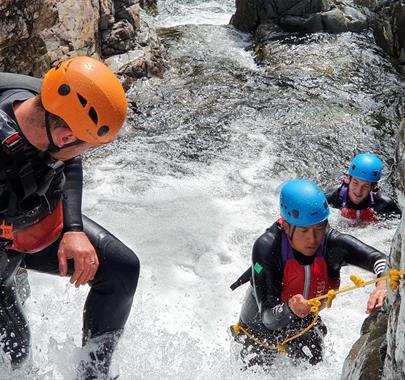 Visitors Extreme Ghyll Scrambling and Canyoning with Path to Adventure in Eskdale, Lake District