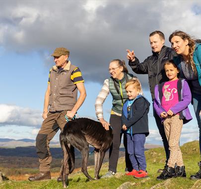 Family on a Scenic Walk near 
Park Cliffe Camping & Caravan Estate in Windermere, Lake District