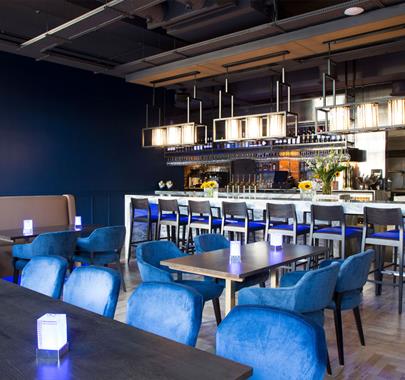 Tables at Penny Blue Restaurant & Bar at The Halston Aparthotel in Carlisle, Cumbria