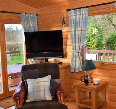 Lounge in Pheasant Lodge at Low Moor Head Farm in Longtown, Cumbria