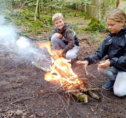 Learn to Make and Safely Manage Fire with Green Man Survival