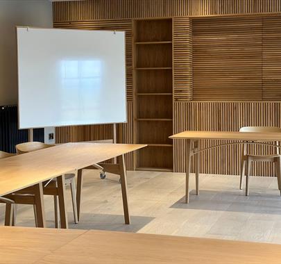 Meeting room layout with whiteboards at The Hub at The Heaning Estate in Windermere, Lake District