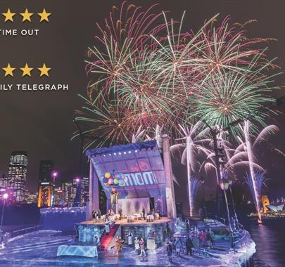 Photo of fireworks above Sydney harbour with a concert being done on the river
