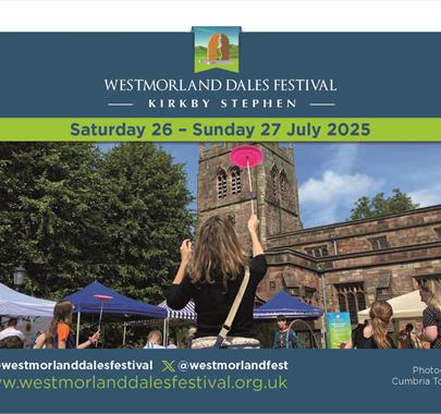 Poster for Westmorland Dales Festival in Kirkby Stephen.
Image of people at the festival by a church