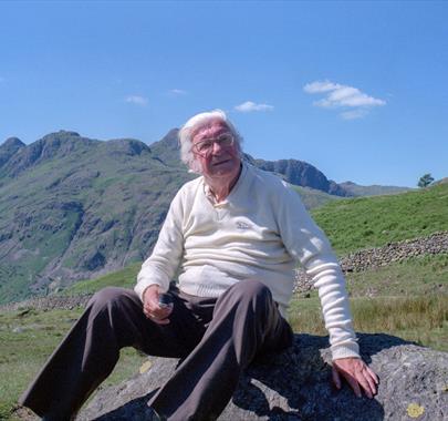Photo of Alfred Wainwright atop a Cumbrian fell