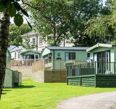 Exteriors of holiday homes for sale at Waterfoot Park in Pooley Bridge, Lake District