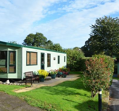 Caravan exteriors at Woodclose Caravan Park in Kirkby Lonsdale, Cumbria