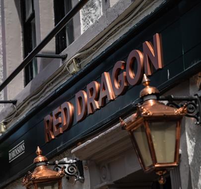 Exterior signage at the Red Dragon Inn in Kirkby Lonsdale, Cumbria