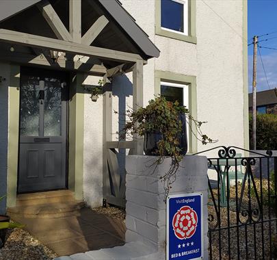 Exterior and Signage at Midtown Farm Bed and Breakfast in Easton, Cumbria