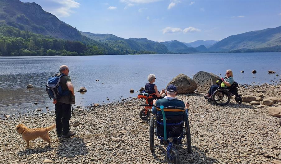 Visitors on the Accessible trail to Broomhill Point viewpoint near Keswick, Lake District