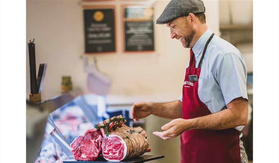 Butcher working at Cranstons in Cumbria