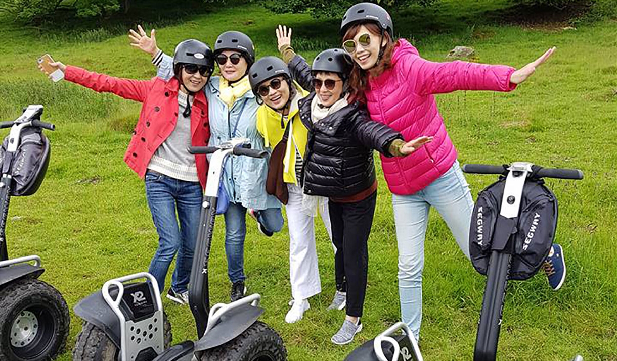 Visitors enjoying an experience with Lakeland Segway in Cartmel, Lake District