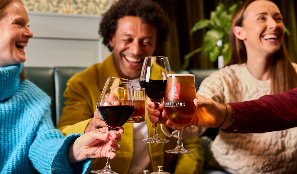 Guests enjoying drinks at The Ambleside Inn in Ambleside, Lake District