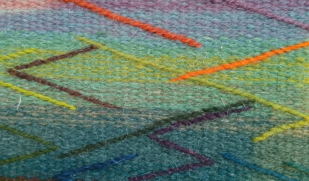 a colourful piece of handwoven textile