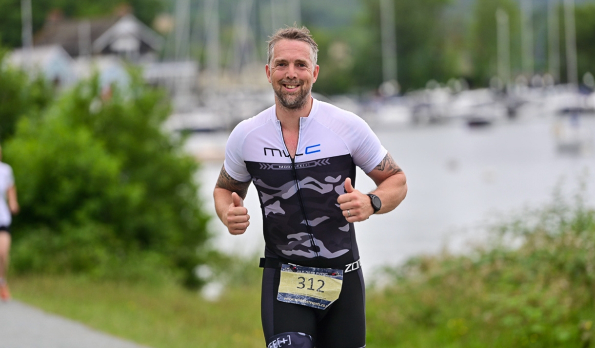Triathlon running alongside Windermere