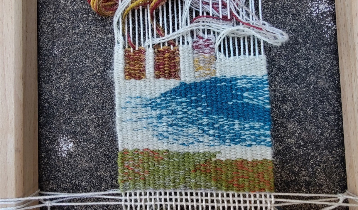 Tapestry being worked on at a workshop at Farfield Mill in Sedbergh, Cumbria