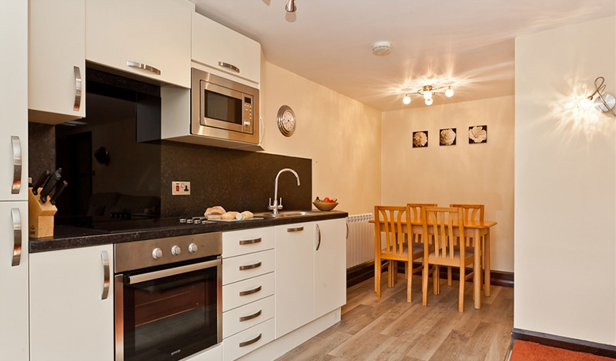 Kitchen and Dining Area in a Self Catered Unit at Burnside Park in Bowness-on-Windermere, Lake District