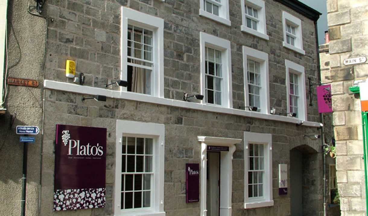 Exterior and signage at Plato's in Kirkby Lonsdale, Cumbria