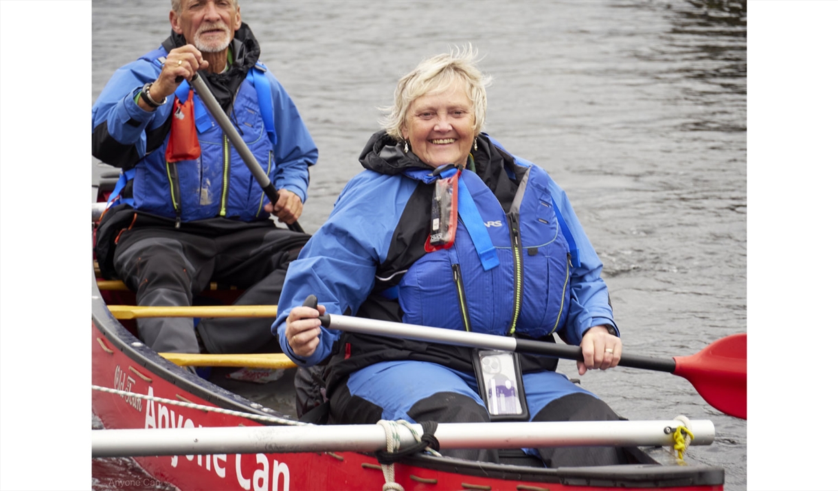 Visitors Canoeing with Anyone Can in the Lake District, Cumbria