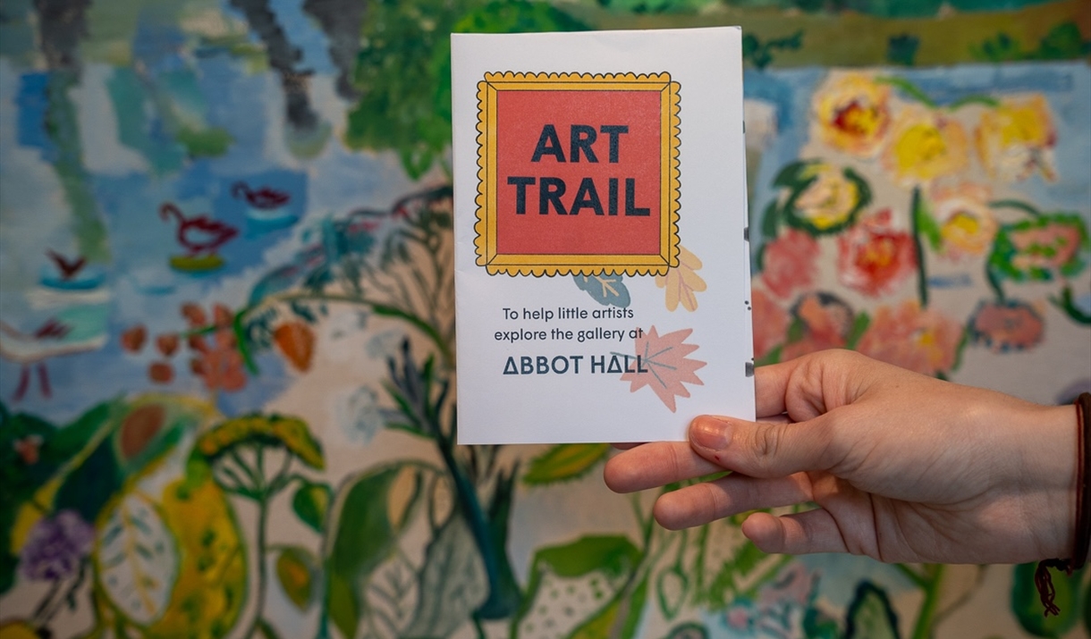 The Art Trail in front of a painting in the Art Herbarium